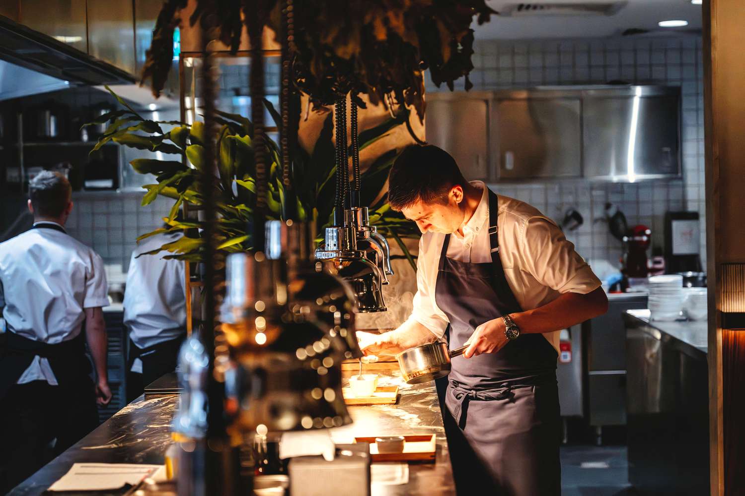 Restaurant kitchen with chefs working